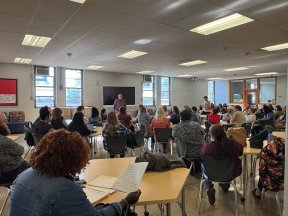 PFT President Steinberg speaks at a member meeting at Frankford High. 